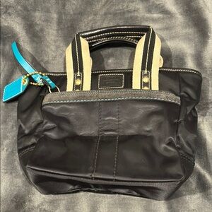 Small Black and Beige Coach Tote Bag with Blue Accent